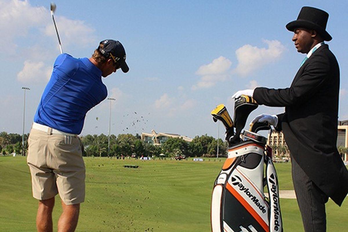 Jannah Burj Al Sarab Hotel Abu Dhabi Exterior foto A golf caddie