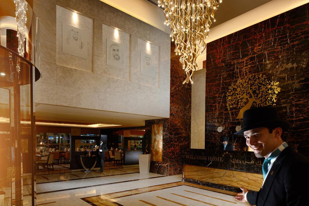 Jannah Burj Al Sarab Hotel Abu Dhabi Exterior foto Lobby
