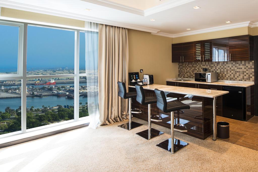 Jannah Burj Al Sarab Hotel Abu Dhabi Exterior foto A kitchen in a serviced apartment