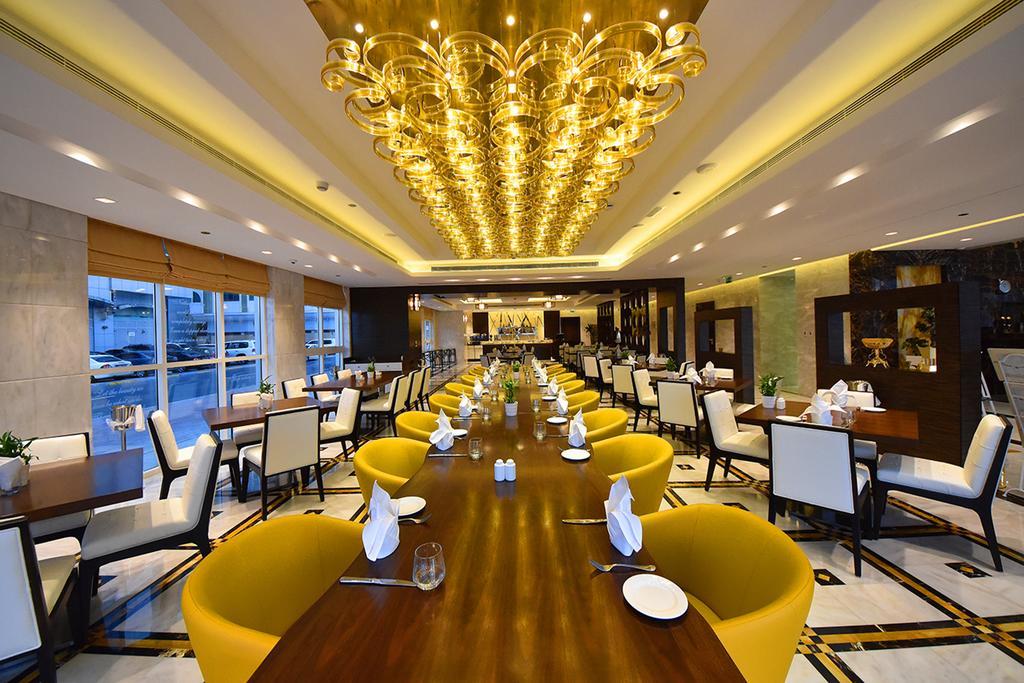 Jannah Burj Al Sarab Hotel Abu Dhabi Exterior foto The restaurant
