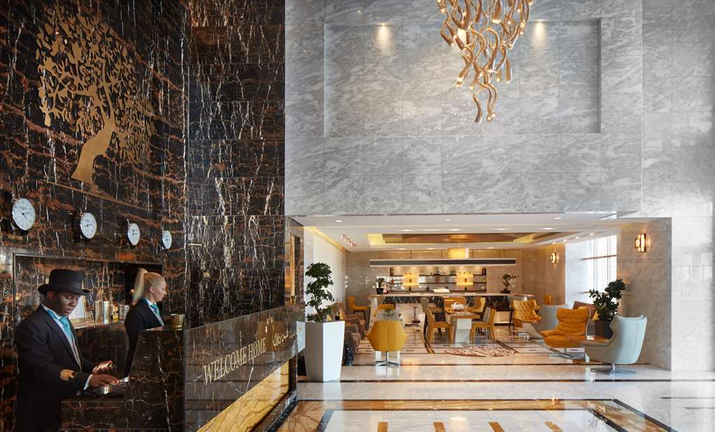 Jannah Burj Al Sarab Hotel Abu Dhabi Exterior foto Lobby